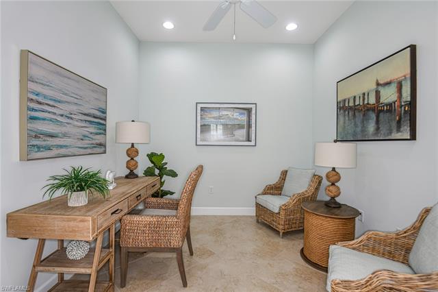 8777 Yucatan Court Naples, FL 34113 - Photo 23 of 41 a living room with furniture and a painting