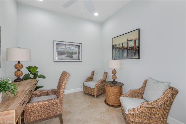 8777 Yucatan Court Naples, FL 34113 - Photo 24 of 41 a living room with furniture and a potted plant