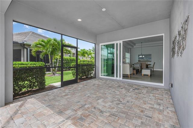 8777 Yucatan Court Naples, FL 34113 - Photo 28 of 41 a view of a room with porch and a patio