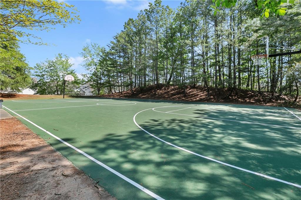203 Sunshower Ridge Canton, GA 30114 - Photo 46 of 58 a view of a tennis court