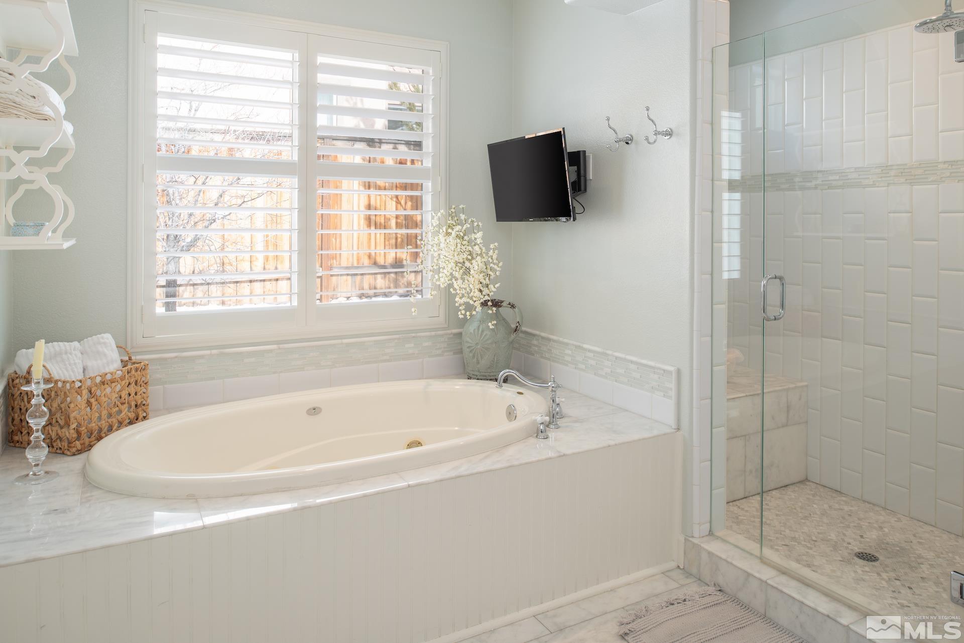 1772 Fairway Hills Trail Reno, NV 89523 - Photo 18 of 33 a white bath tub sitting next to a shower