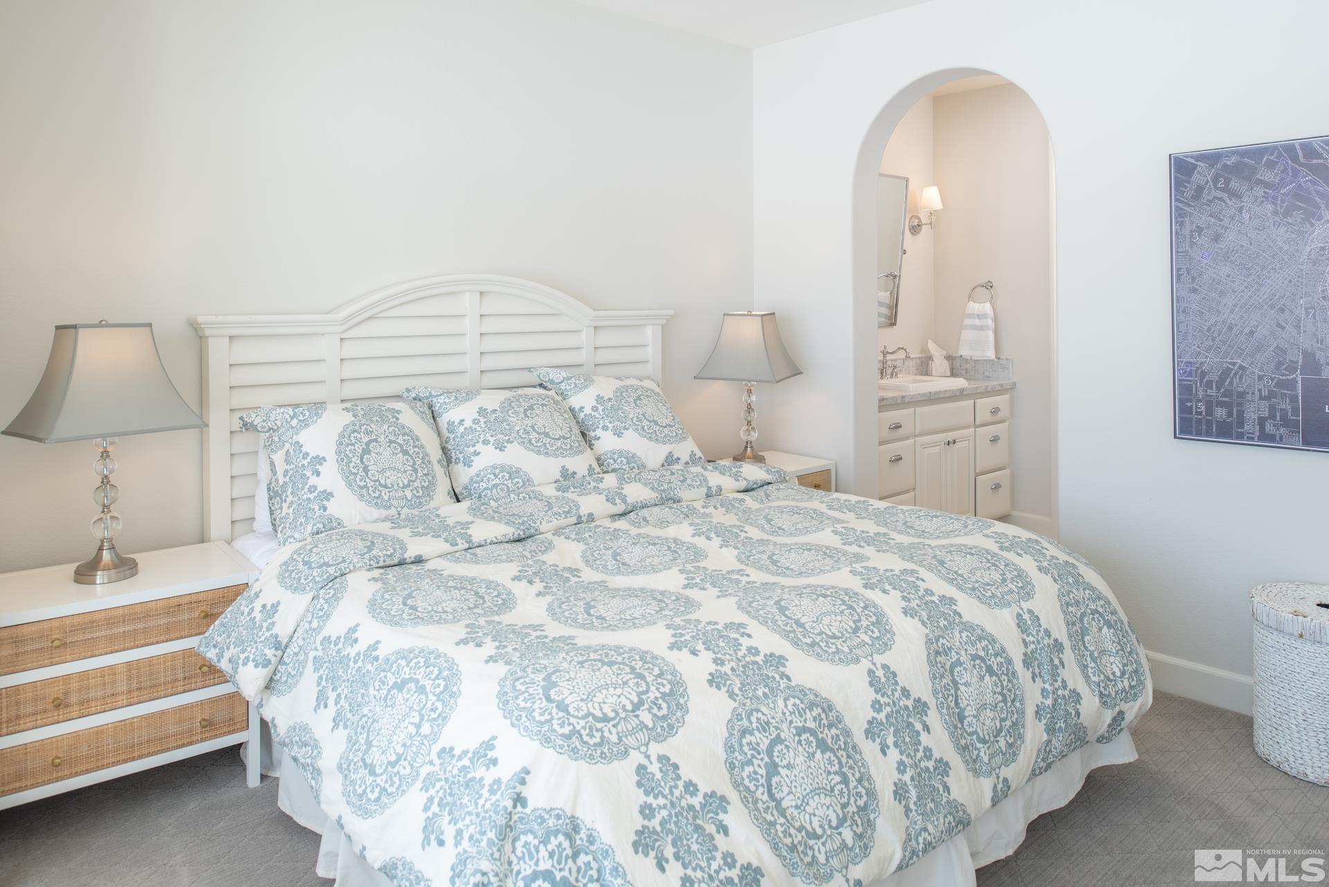 1772 Fairway Hills Trail Reno, NV 89523 - Photo 20 of 33 a bedroom with a bed and a lamp