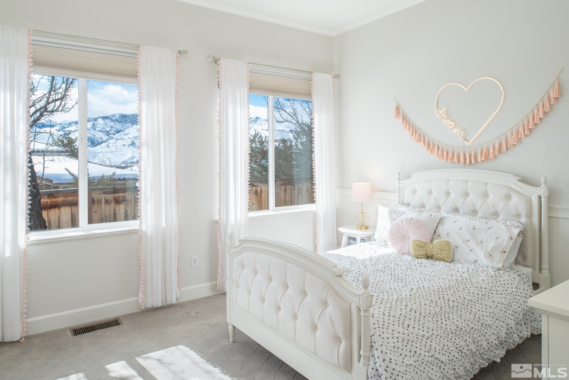1772 Fairway Hills Trail Reno, NV 89523 - Photo 23 of 33 a bedroom with a bed and a large window