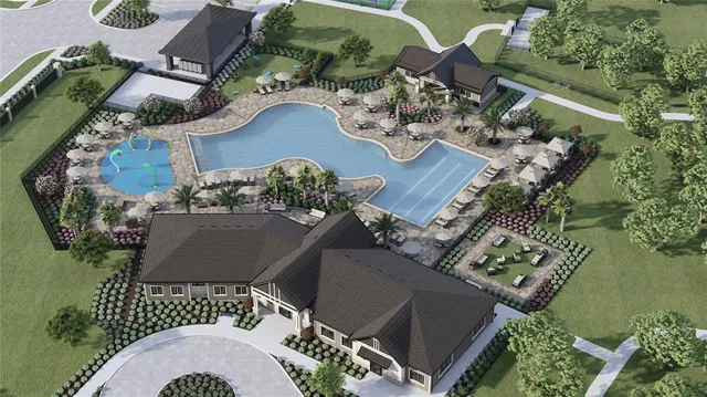 an aerial view of a house with outdoor space