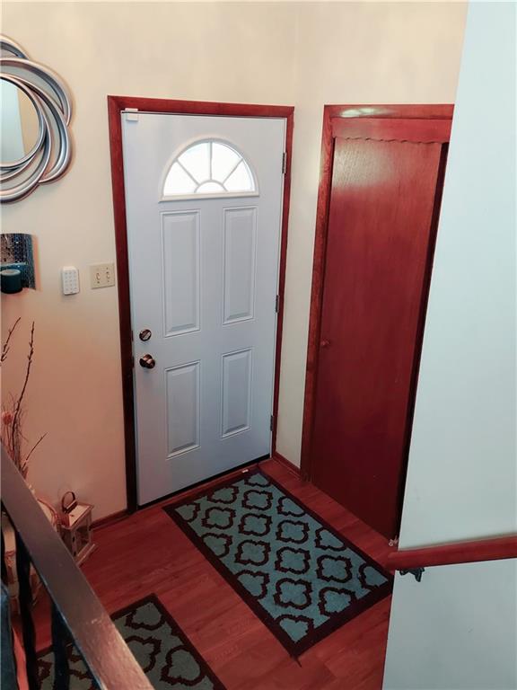 476 Ross Road Eighty Four, PA 15330 - Photo 11 of 20 a view of a hallway with wooden floor and a sink