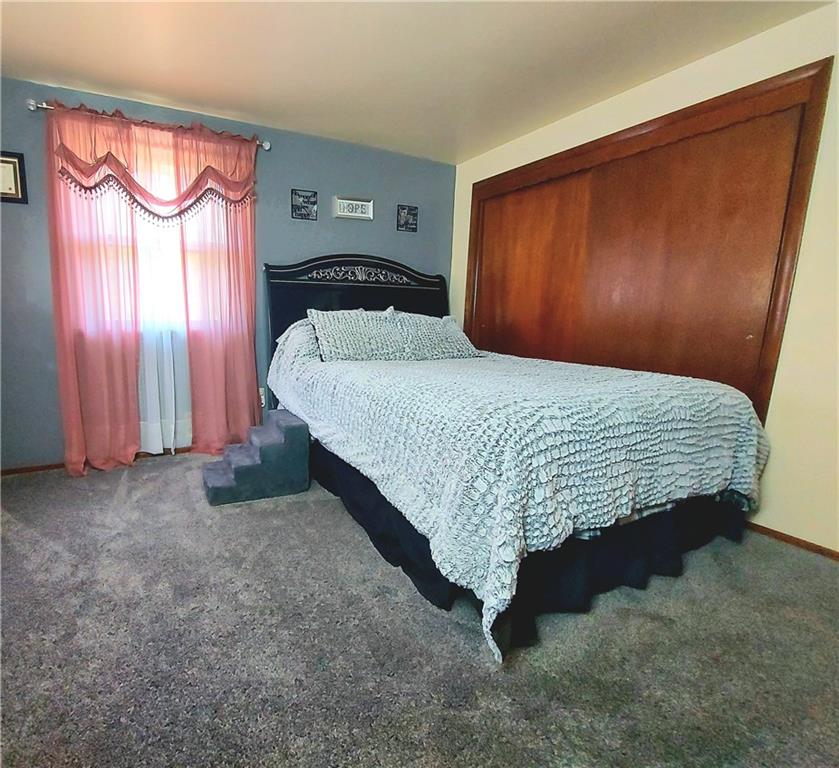 476 Ross Road Eighty Four, PA 15330 - Photo 5 of 20 a bedroom with a bed and a mirror