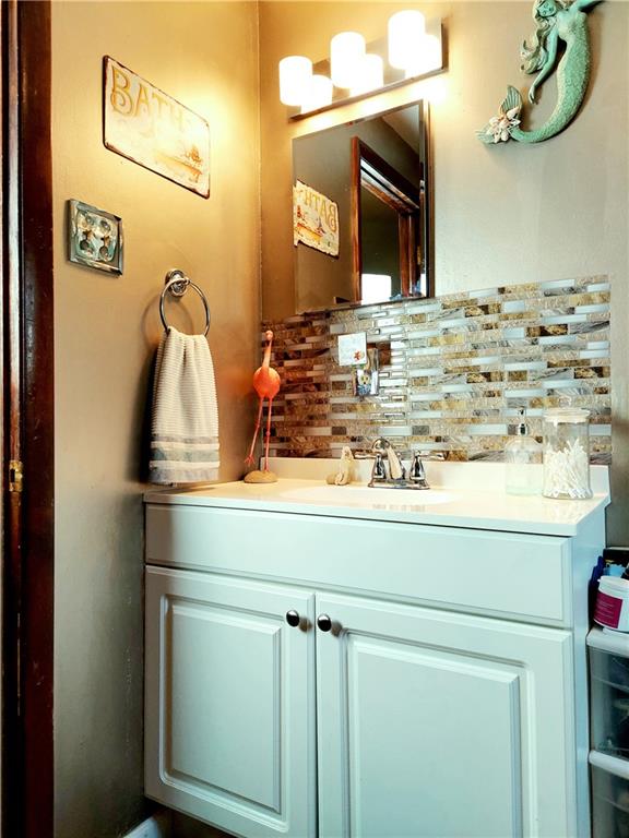 476 Ross Road Eighty Four, PA 15330 - Photo 7 of 20 a bathroom with a sink and a mirror