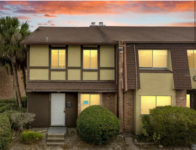 a front view of a house having yard