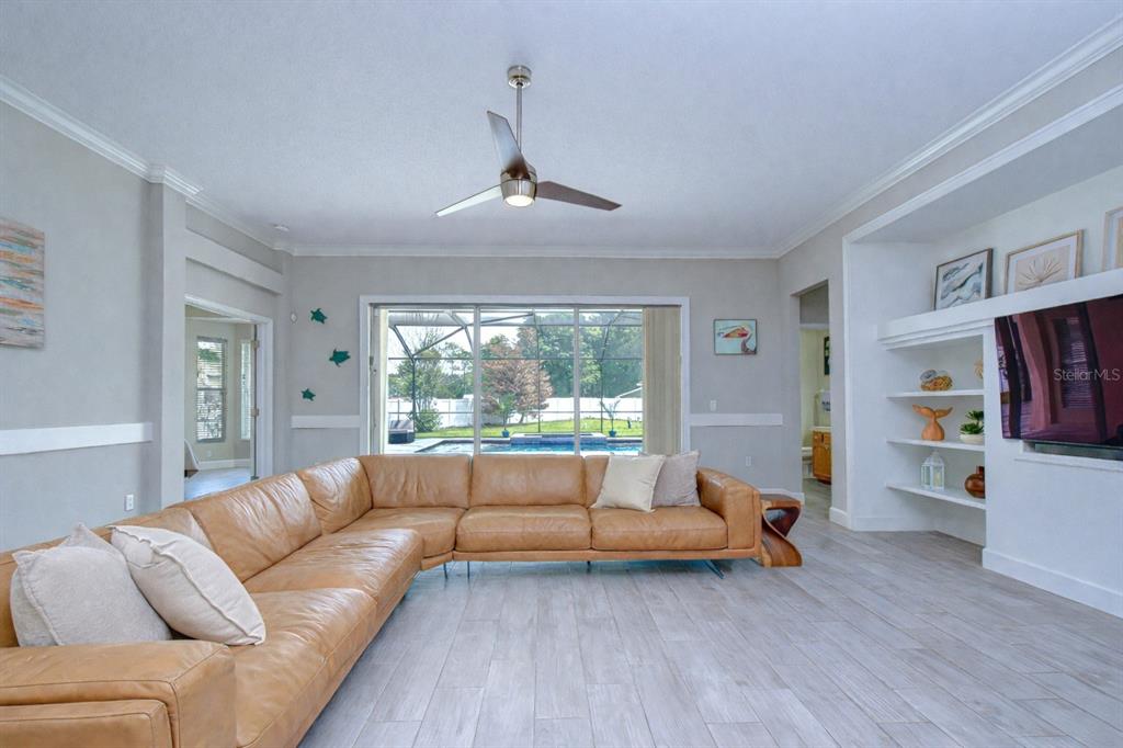 14112 Creek Run Drive Riverview, FL 33579 - Photo 17 of 40 a living room with furniture and a large window