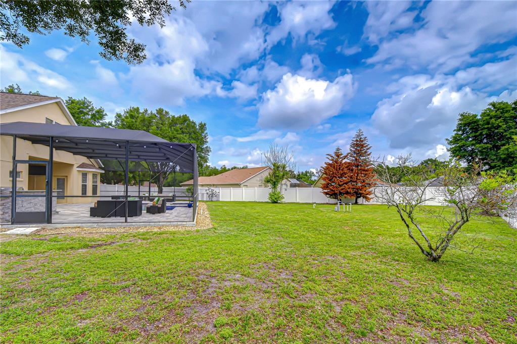 14112 Creek Run Drive Riverview, FL 33579 - Photo 2 of 40 a view of a house with a backyard porch and sitting area