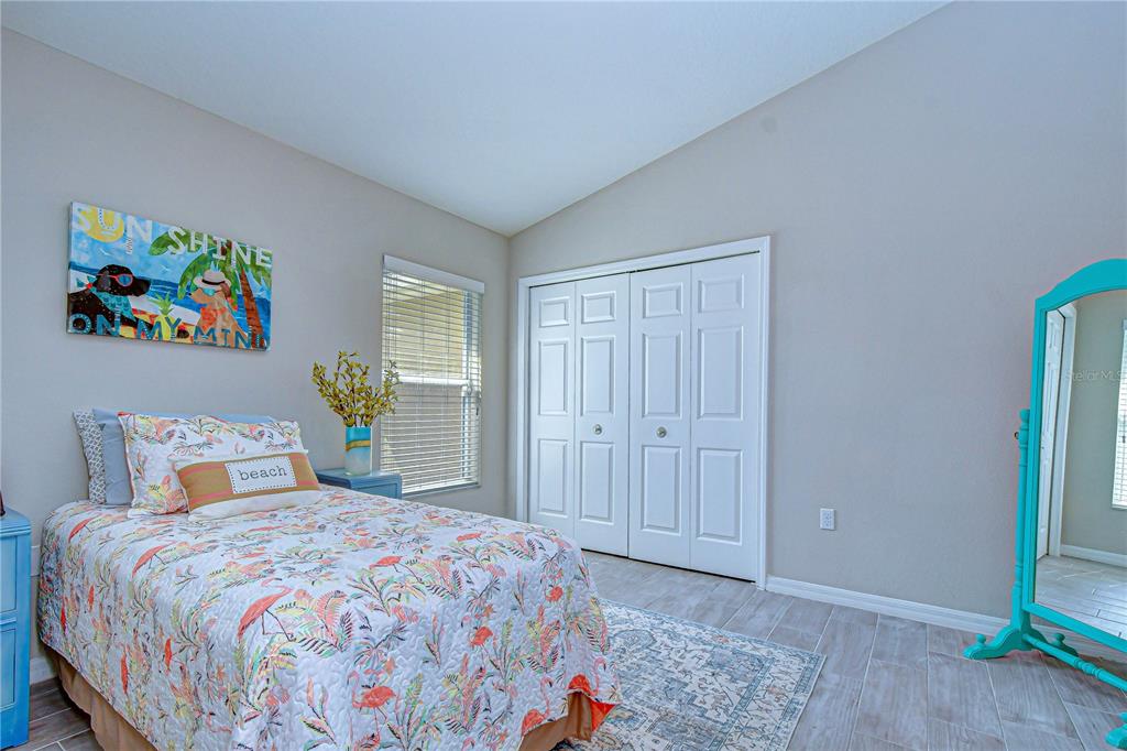 14112 Creek Run Drive Riverview, FL 33579 - Photo 27 of 40 a bedroom with a bed and a window
