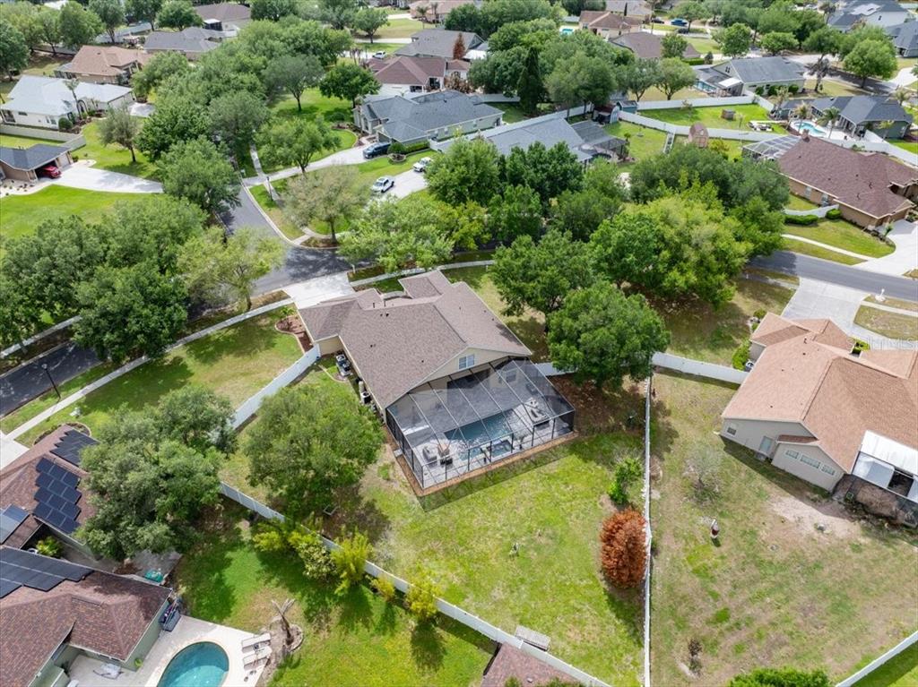 14112 Creek Run Drive Riverview, FL 33579 - Photo 3 of 40 an aerial view of a house with a garden and lake view
