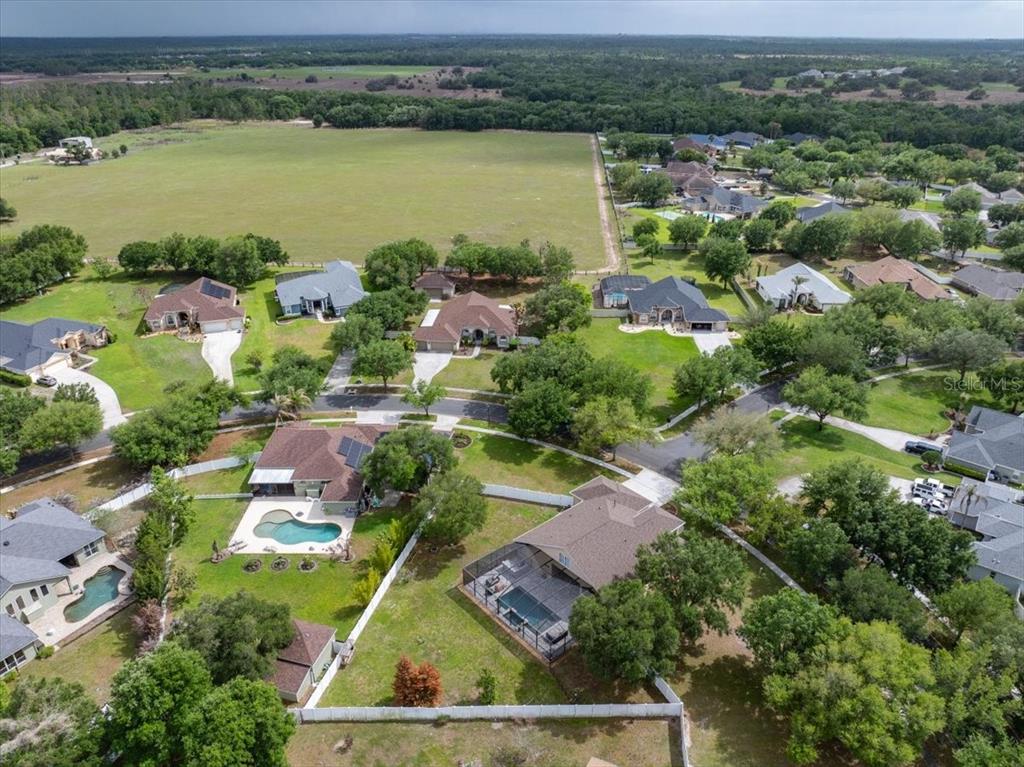 14112 Creek Run Drive Riverview, FL 33579 - Photo 37 of 40 an aerial view of house with yard lake and ocean view