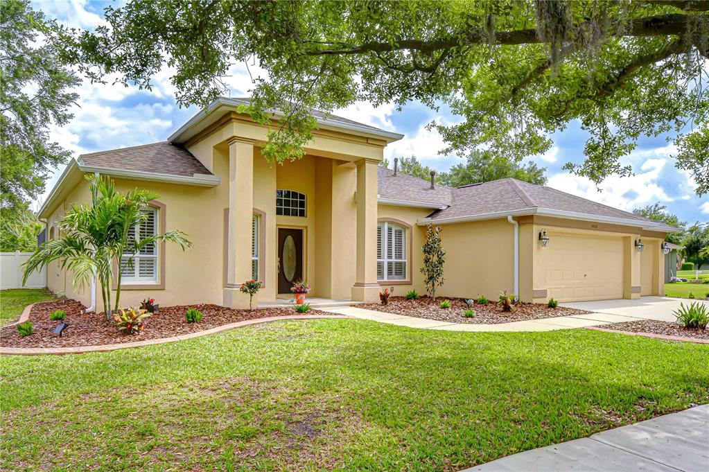14112 Creek Run Drive Riverview, FL 33579 - Photo 39 of 40 a front view of a house with a yard