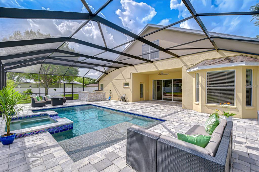 14112 Creek Run Drive Riverview, FL 33579 - Photo 6 of 40 a swimming pool with patio outdoor seating and yard