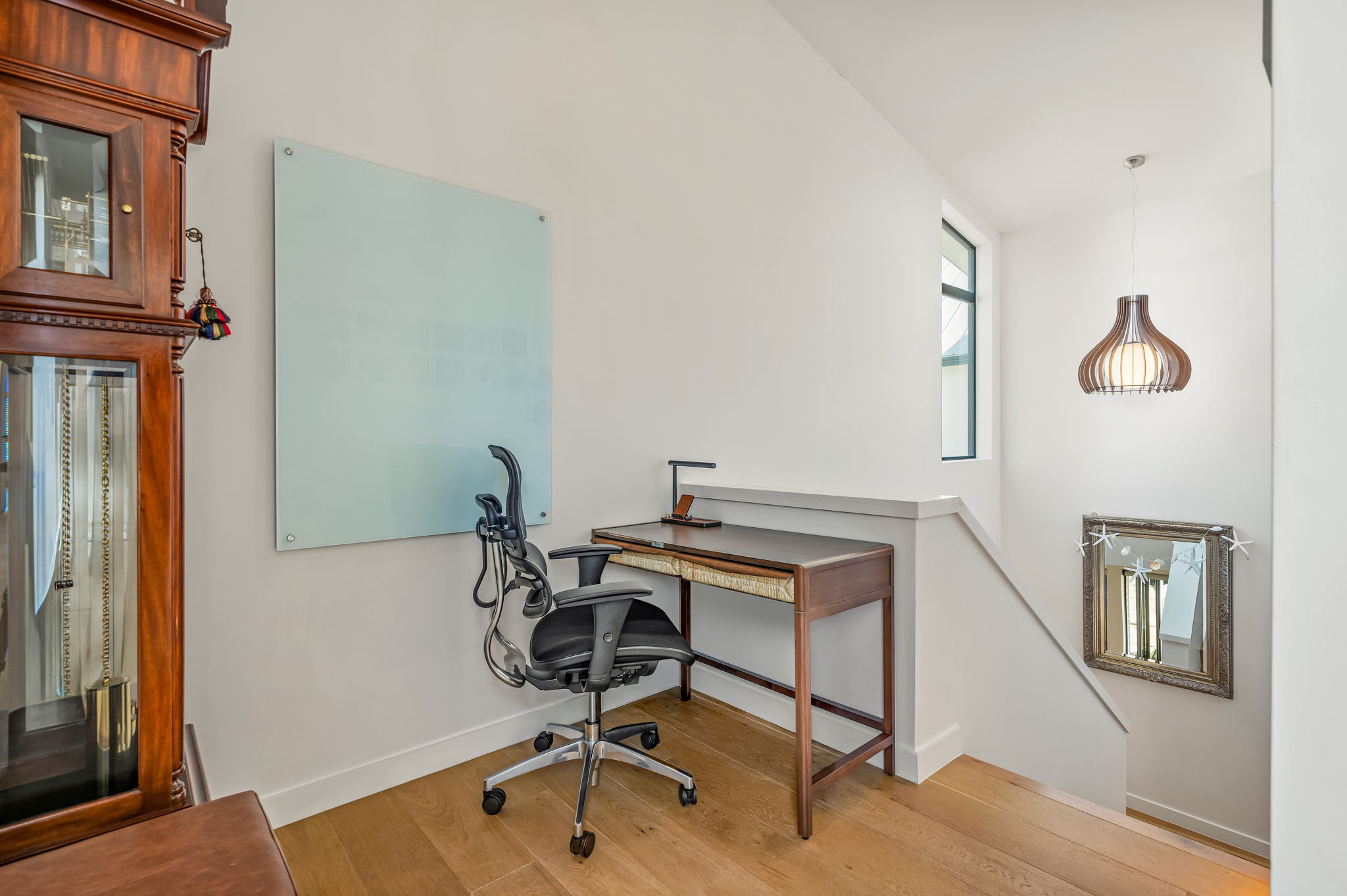 1811 Collier Street Austin, TX 78704 - Photo 25 of 40 This versatile space features hardwood floors, a built-in desk, and a large window providing natural light