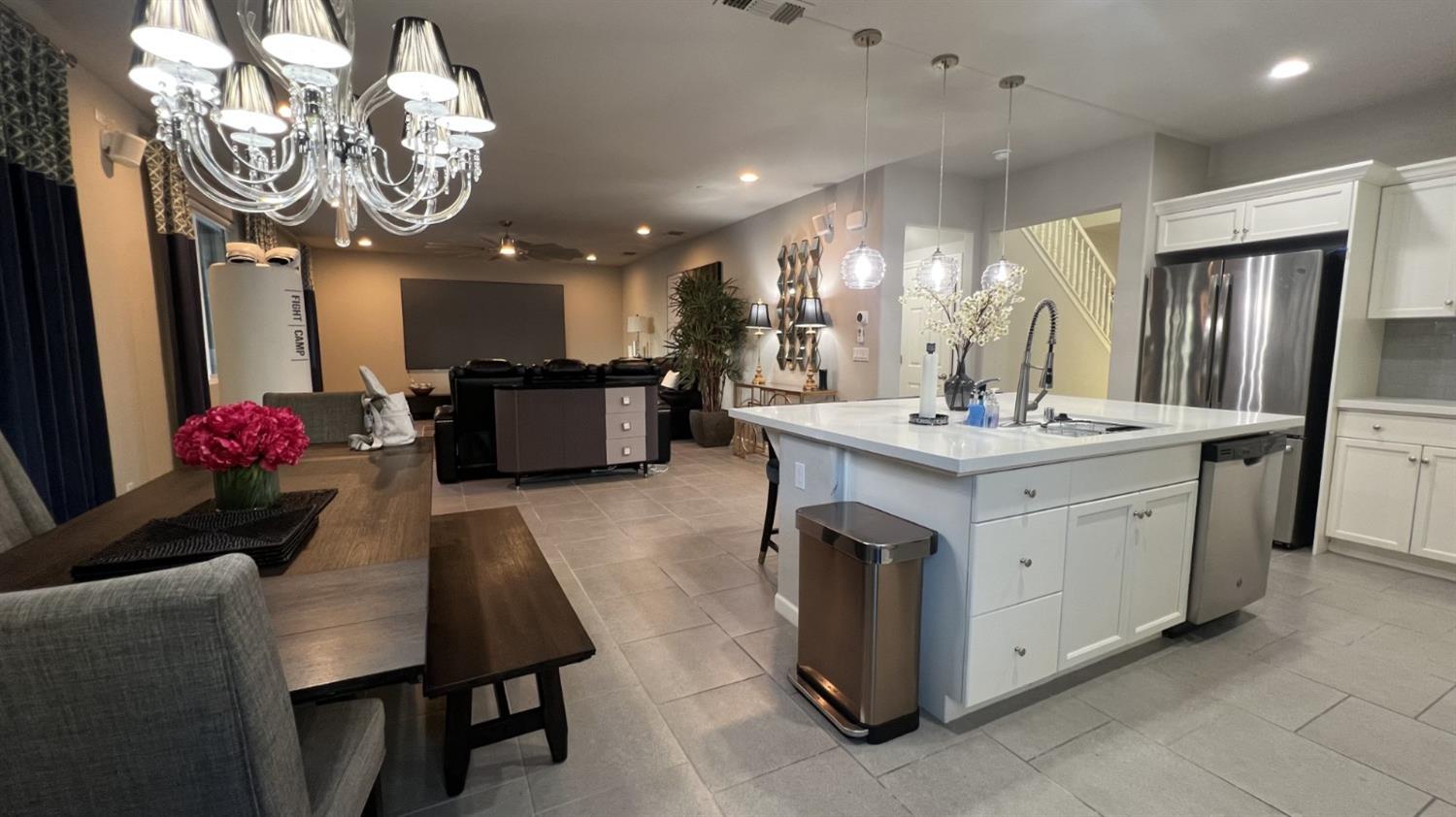 3525 Cordova Avenue Clovis, CA 93619 - Photo 12 of 35 a kitchen with a sink appliances and cabinets