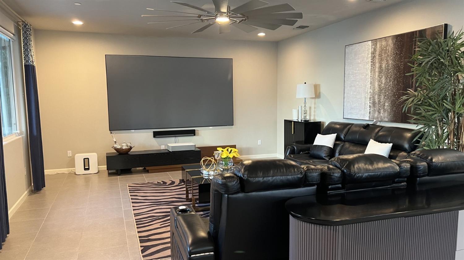 3525 Cordova Avenue Clovis, CA 93619 - Photo 15 of 35 a living room with furniture and a flat screen tv