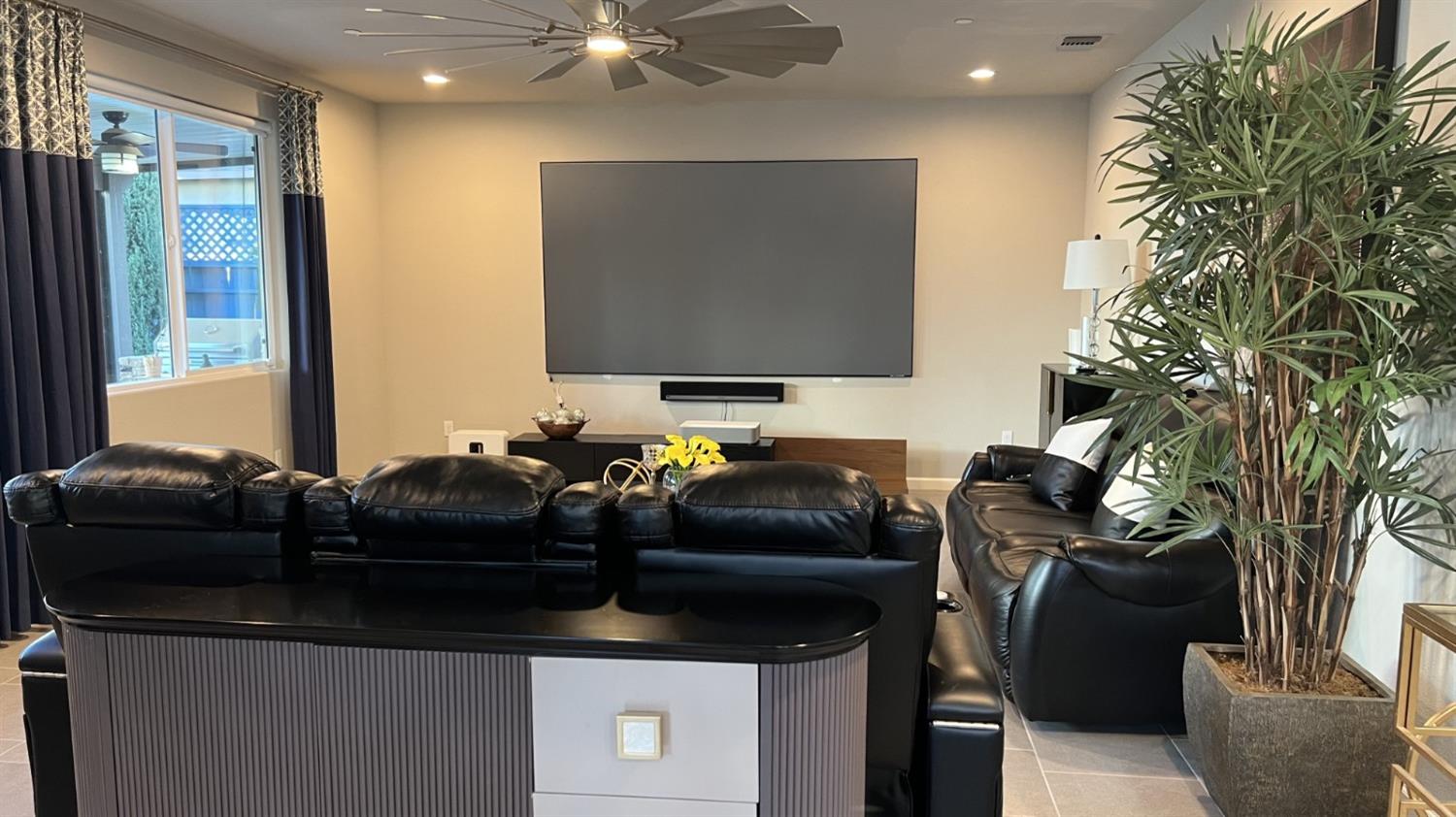 3525 Cordova Avenue Clovis, CA 93619 - Photo 16 of 35 a living room with furniture and a flat screen tv