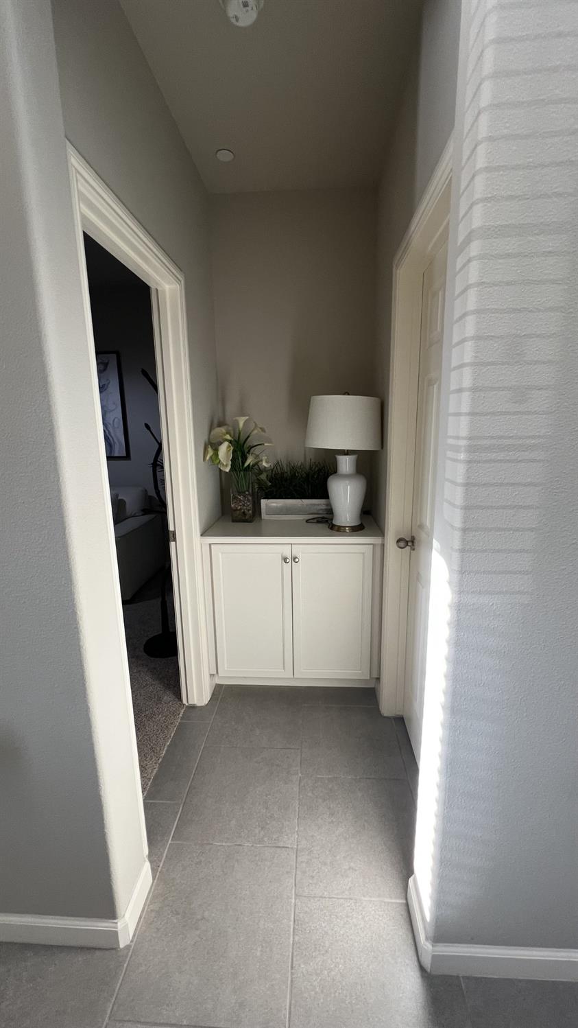 3525 Cordova Avenue Clovis, CA 93619 - Photo 17 of 35 a bathroom with a sink a toilet and vanity