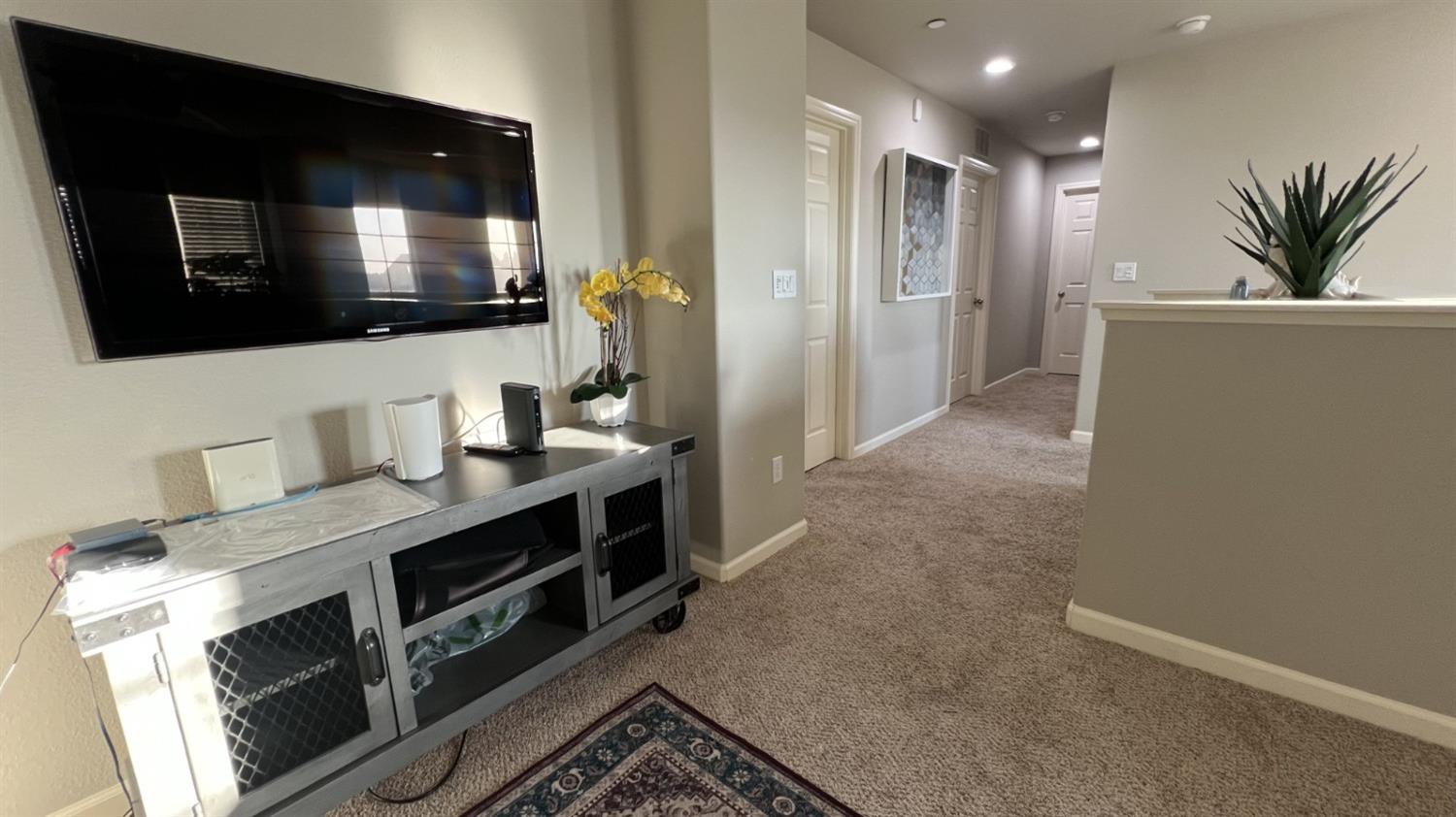 3525 Cordova Avenue Clovis, CA 93619 - Photo 22 of 35 a kitchen with stainless steel appliances a stove and a microwave