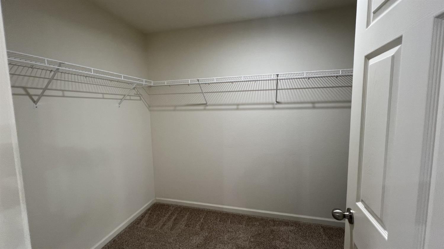 3525 Cordova Avenue Clovis, CA 93619 - Photo 27 of 35 a view of a room with racks on the wall