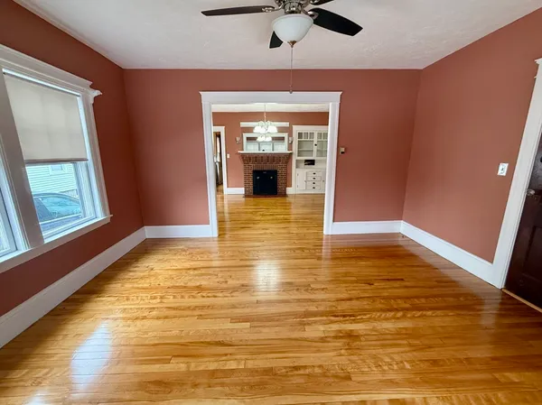 a view of an empty room and window