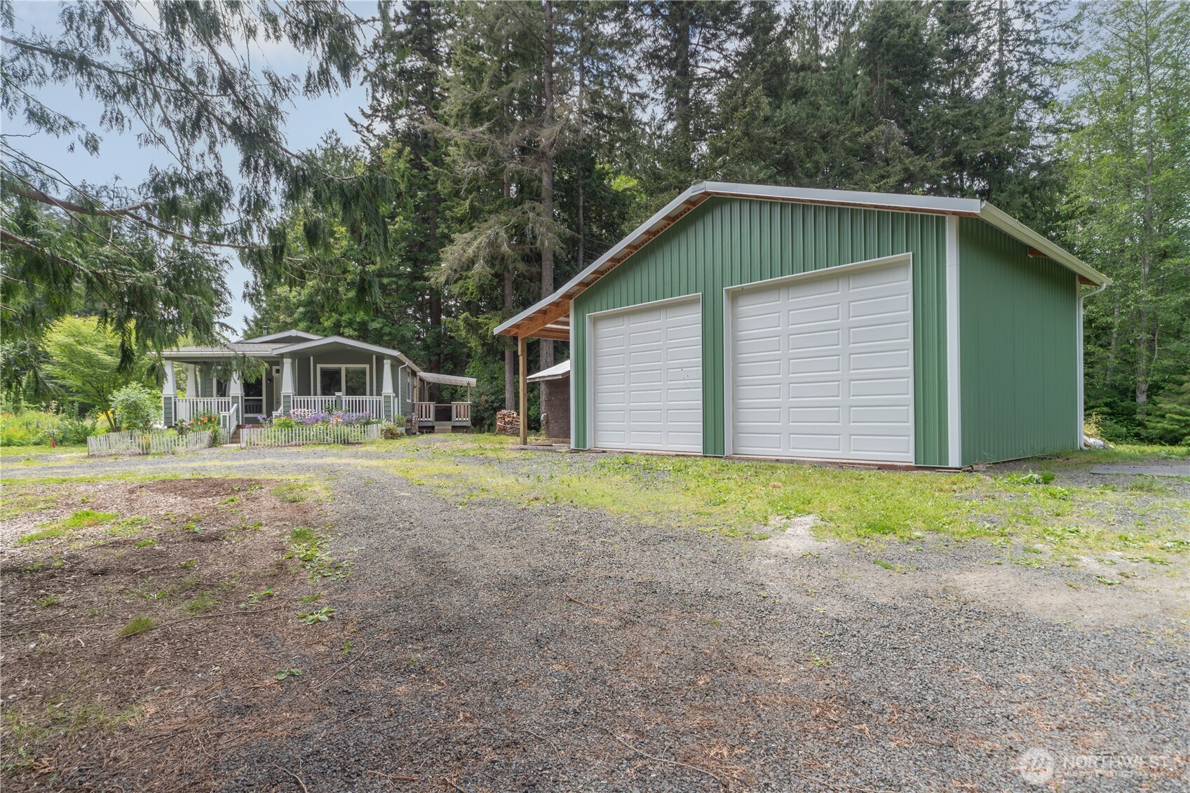 290 Werner Road Port Ludlow, WA 98365 - Photo 33 of 40 a house with trees in the background
