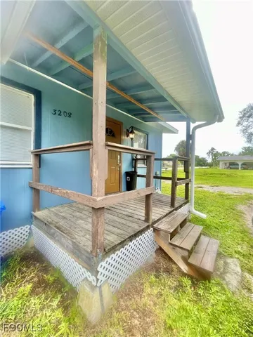 a view of swimming pool with seating area