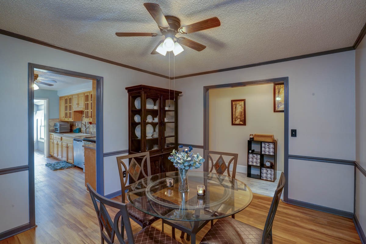 1157 Morgan Road Lafayette, TN 37083 - Photo 11 of 45 a view of a dining room with furniture and wooden floor