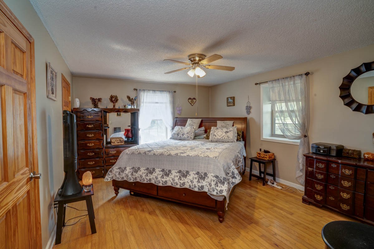 1157 Morgan Road Lafayette, TN 37083 - Photo 16 of 45 a bedroom with a bed dresser and a window