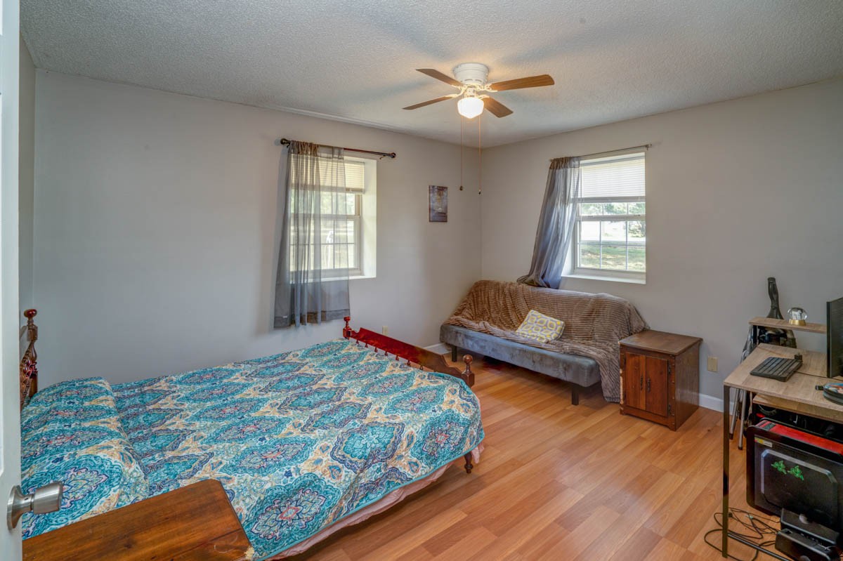 1157 Morgan Road Lafayette, TN 37083 - Photo 23 of 45 a bedroom with a bed and wooden floor