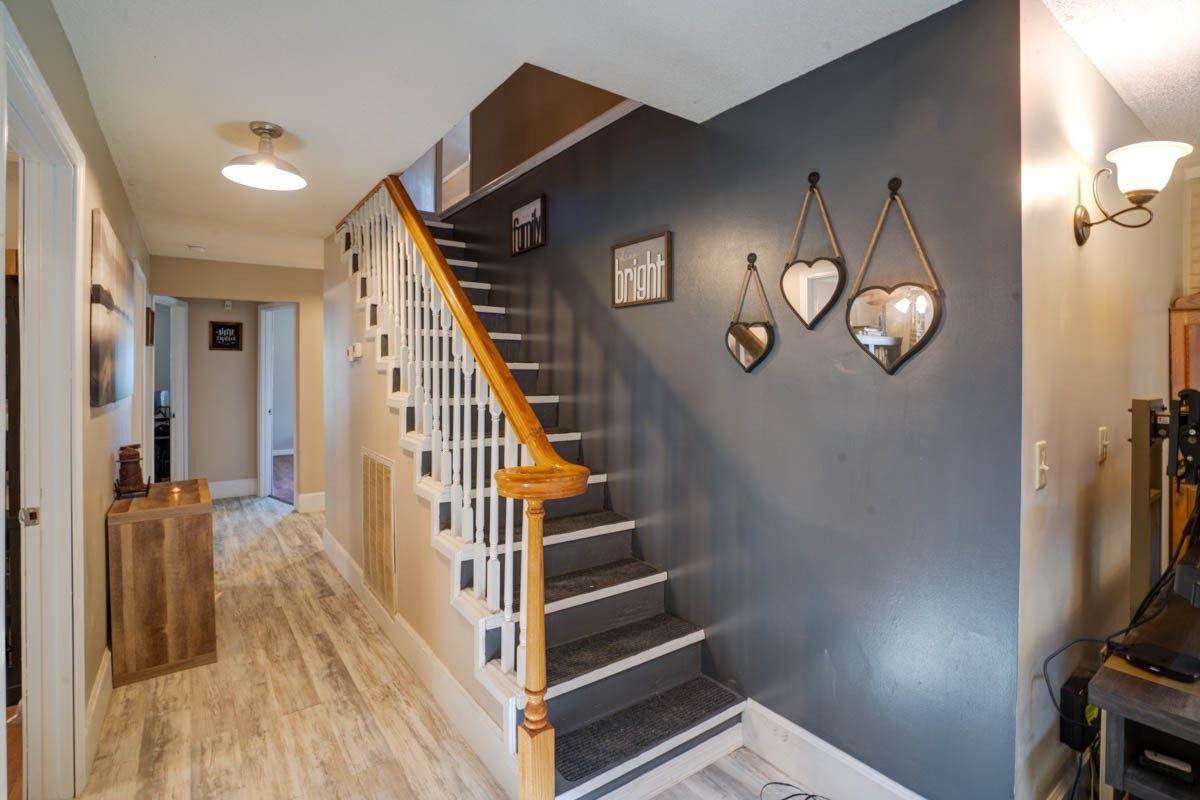 1157 Morgan Road Lafayette, TN 37083 - Photo 27 of 45 a view of hallway with stairs and wooden floor