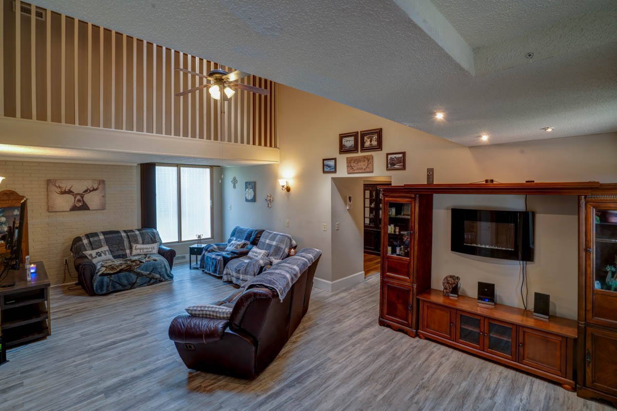 1157 Morgan Road Lafayette, TN 37083 - Photo 5 of 45 a living room with furniture and a flat screen tv