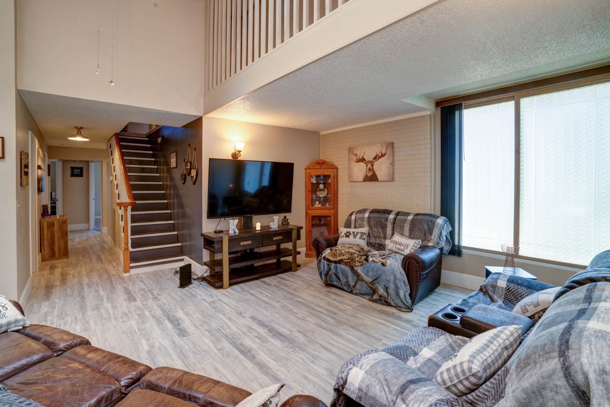 1157 Morgan Road Lafayette, TN 37083 - Photo 8 of 45 a living room with furniture and a flat screen tv