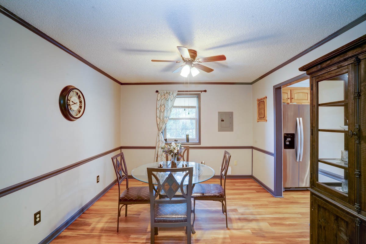 1157 Morgan Road Lafayette, TN 37083 - Photo 9 of 45 a view of a dining room with furniture window and wooden floor