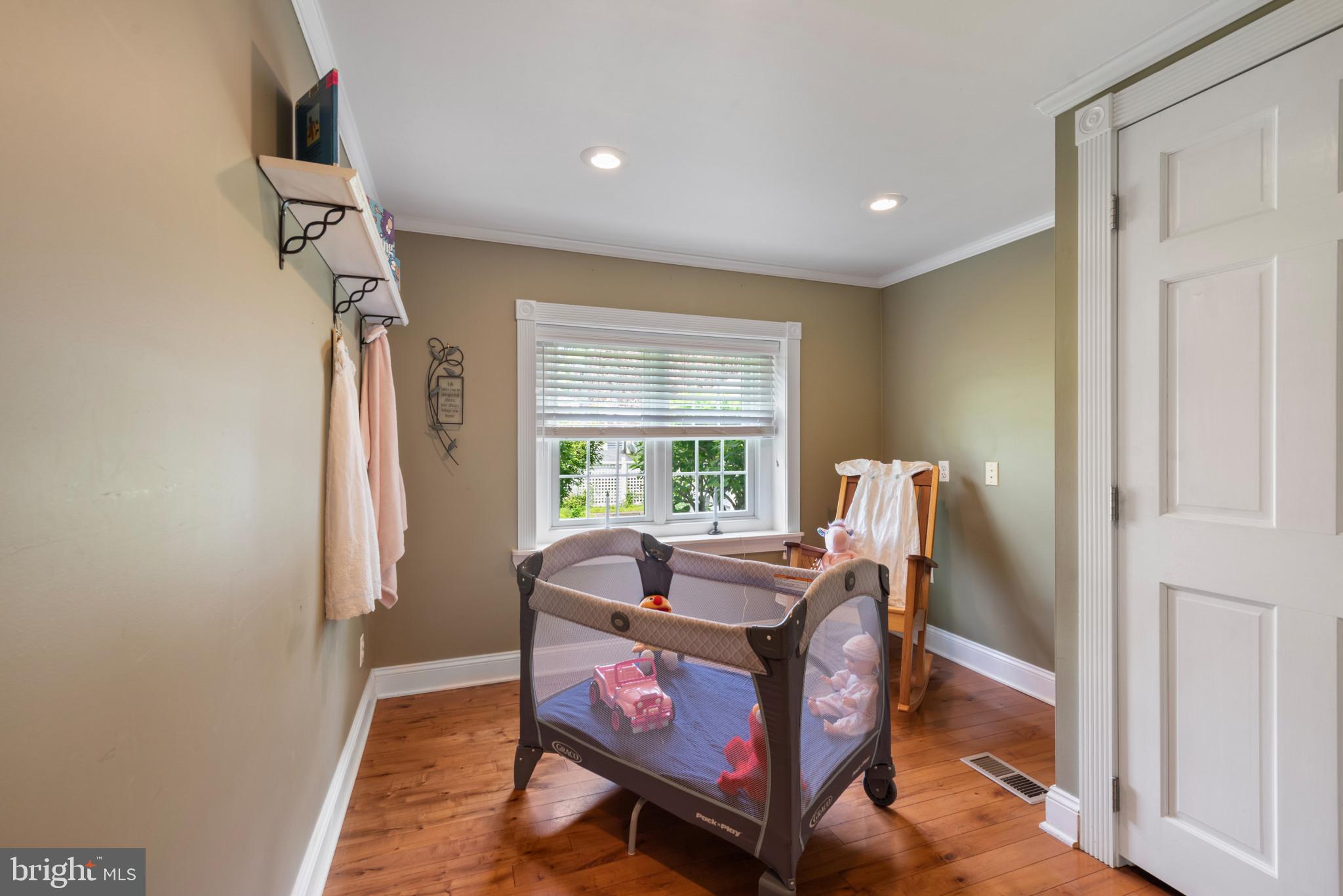 832 Muller Road Westminster, MD 21157 - Photo 12 of 39 a room with furniture a window and a ceiling fan