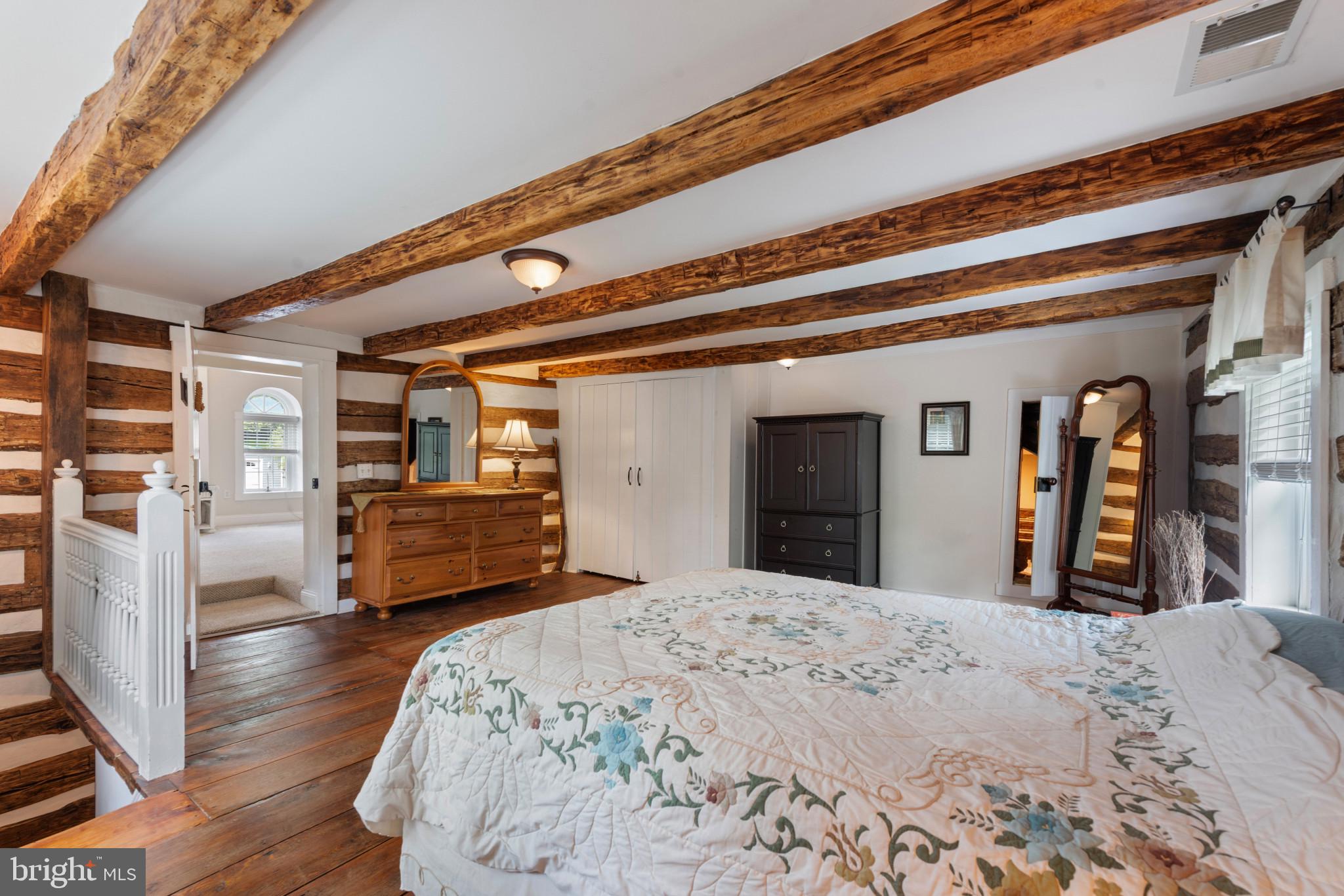 832 Muller Road Westminster, MD 21157 - Photo 15 of 39 a bedroom with a bed and a large dresser