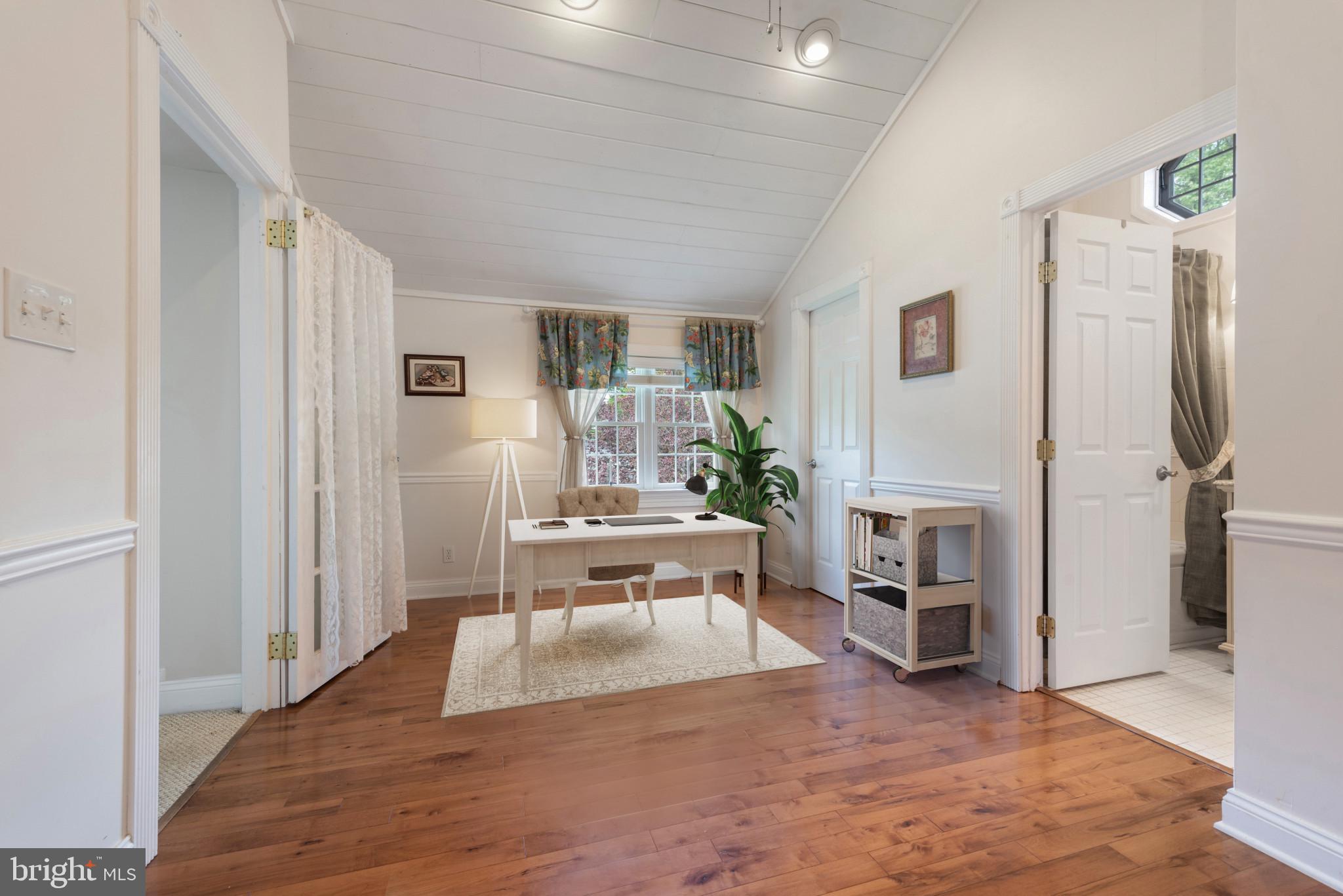 832 Muller Road Westminster, MD 21157 - Photo 17 of 39 a living room with furniture a fireplace and a window