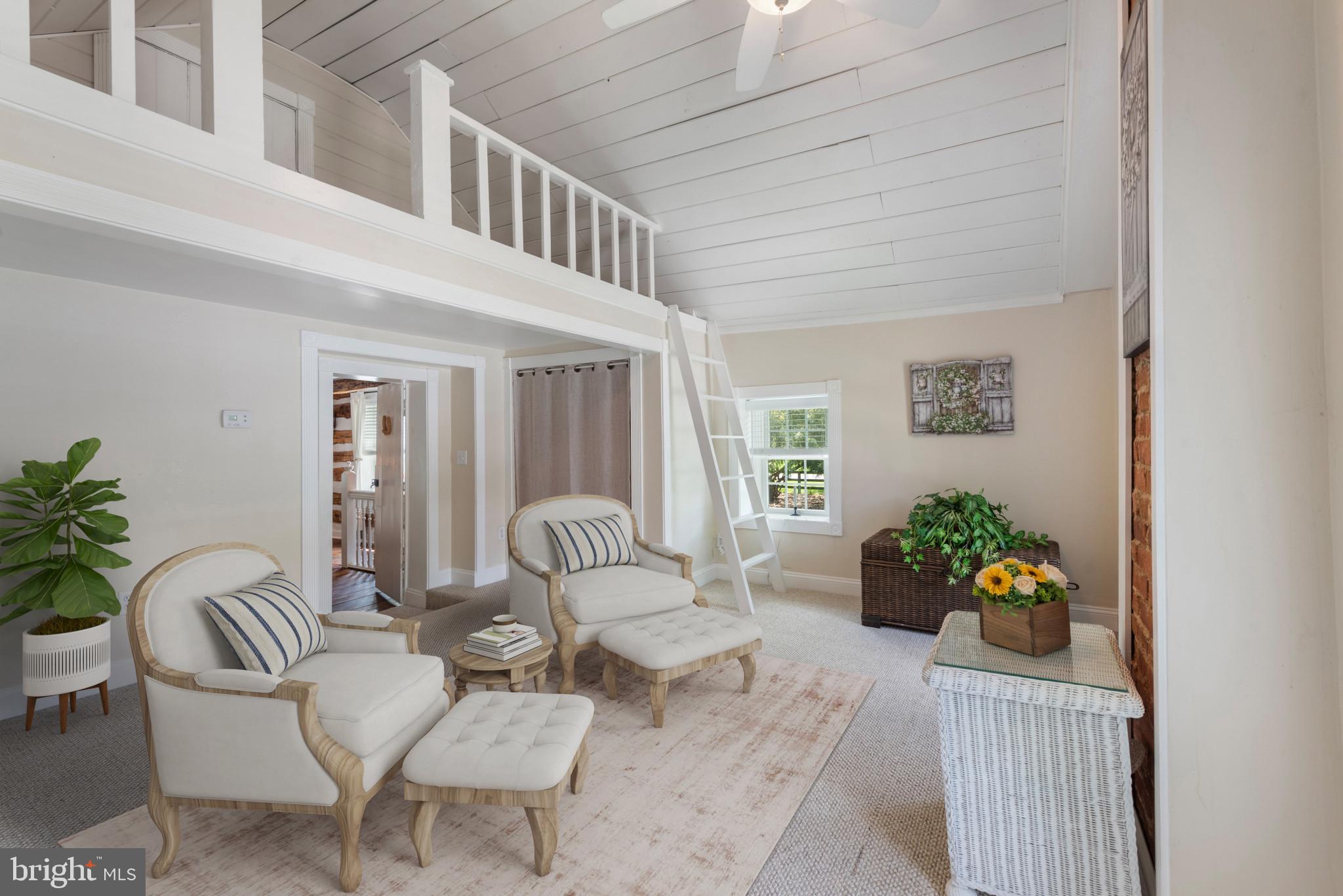 832 Muller Road Westminster, MD 21157 - Photo 18 of 39 a living room with furniture flowers and a rug