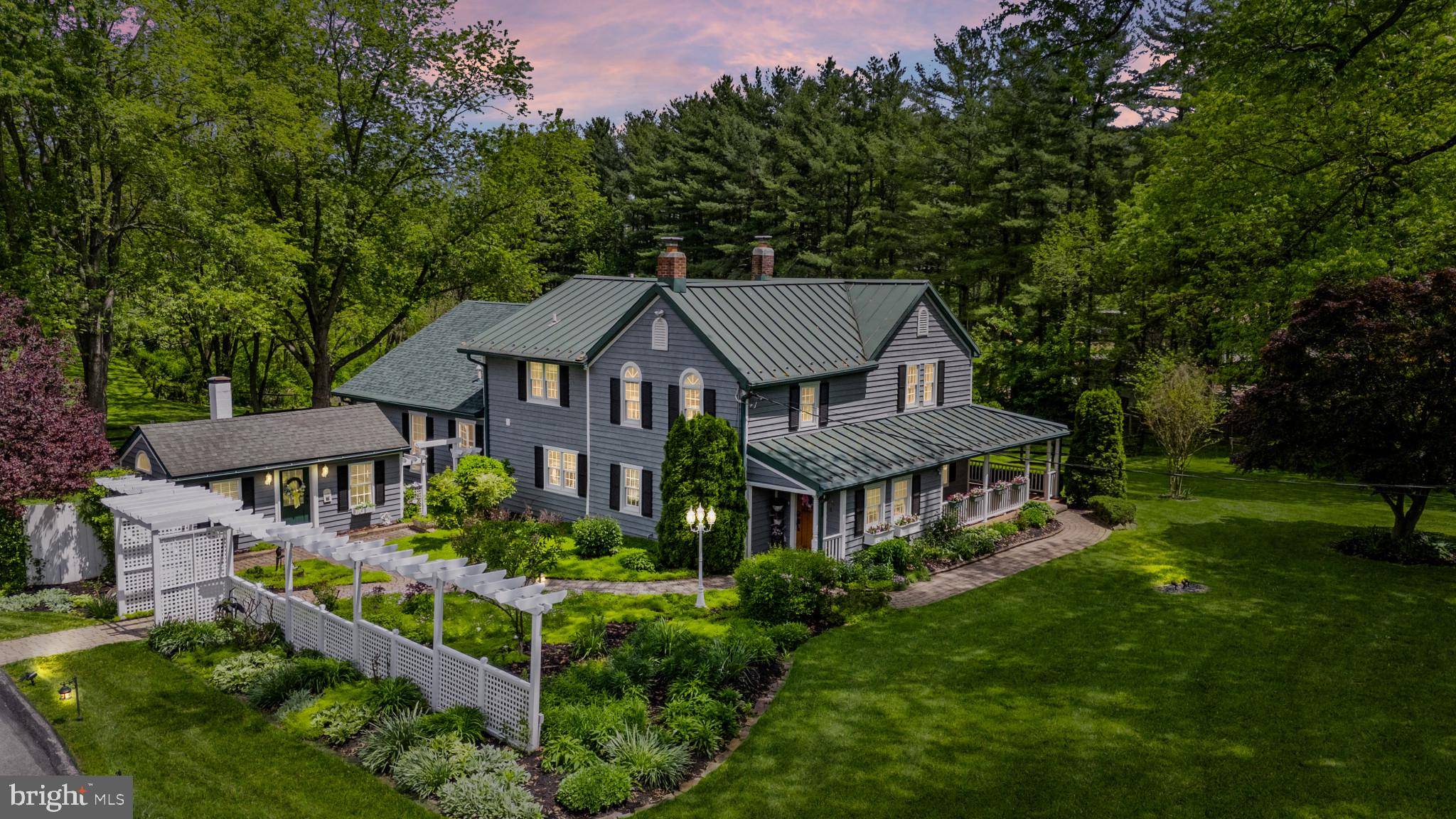 832 Muller Road Westminster, MD 21157 - Photo 2 of 39 a view of a house with a yard and potted plants