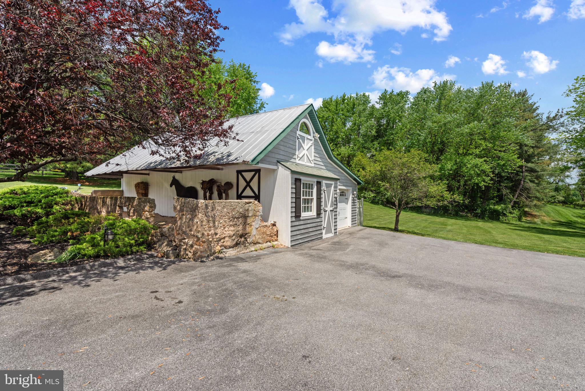 832 Muller Road Westminster, MD 21157 - Photo 34 of 39 a view of a house with a yard and potted plants