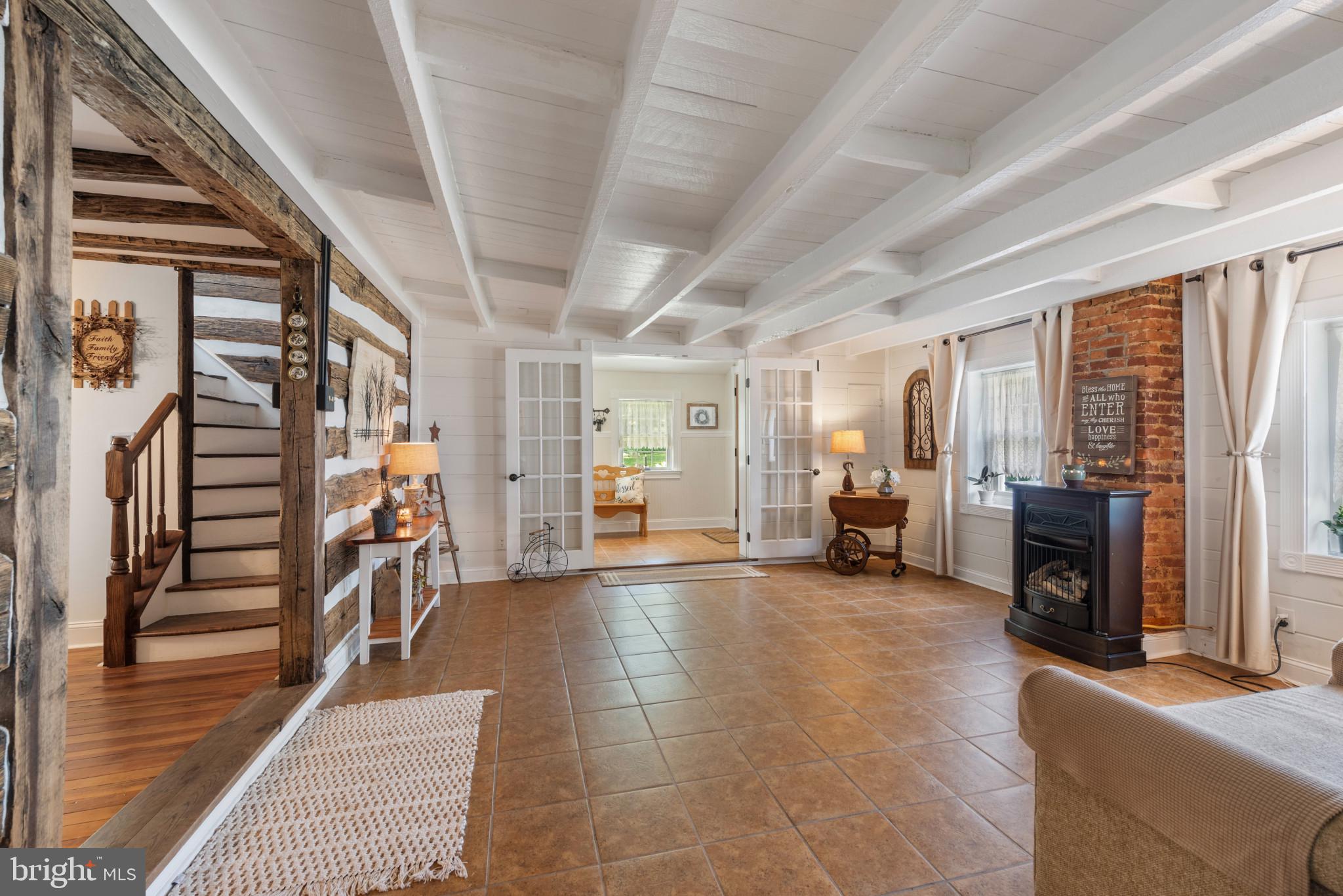 832 Muller Road Westminster, MD 21157 - Photo 4 of 39 a view of a livingroom with furniture and an entryway