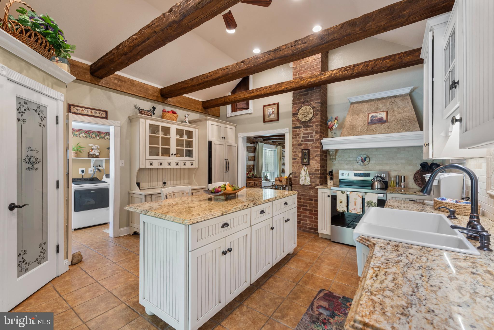 832 Muller Road Westminster, MD 21157 - Photo 7 of 39 a kitchen that has a lot of cabinets in it
