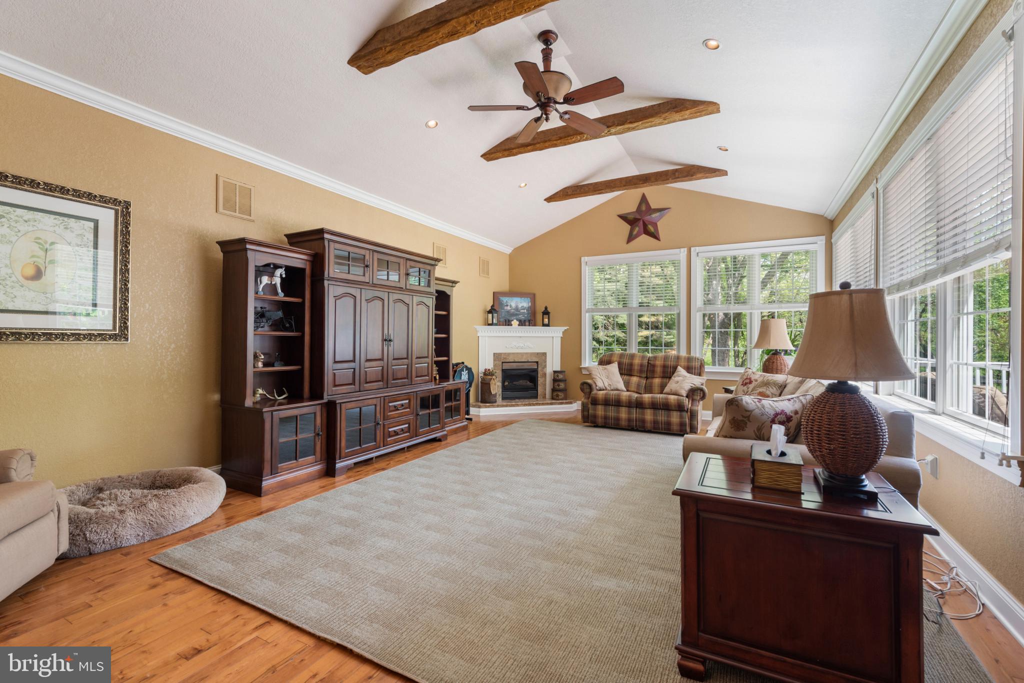 832 Muller Road Westminster, MD 21157 - Photo 8 of 39 a living room with furniture and a flat screen tv