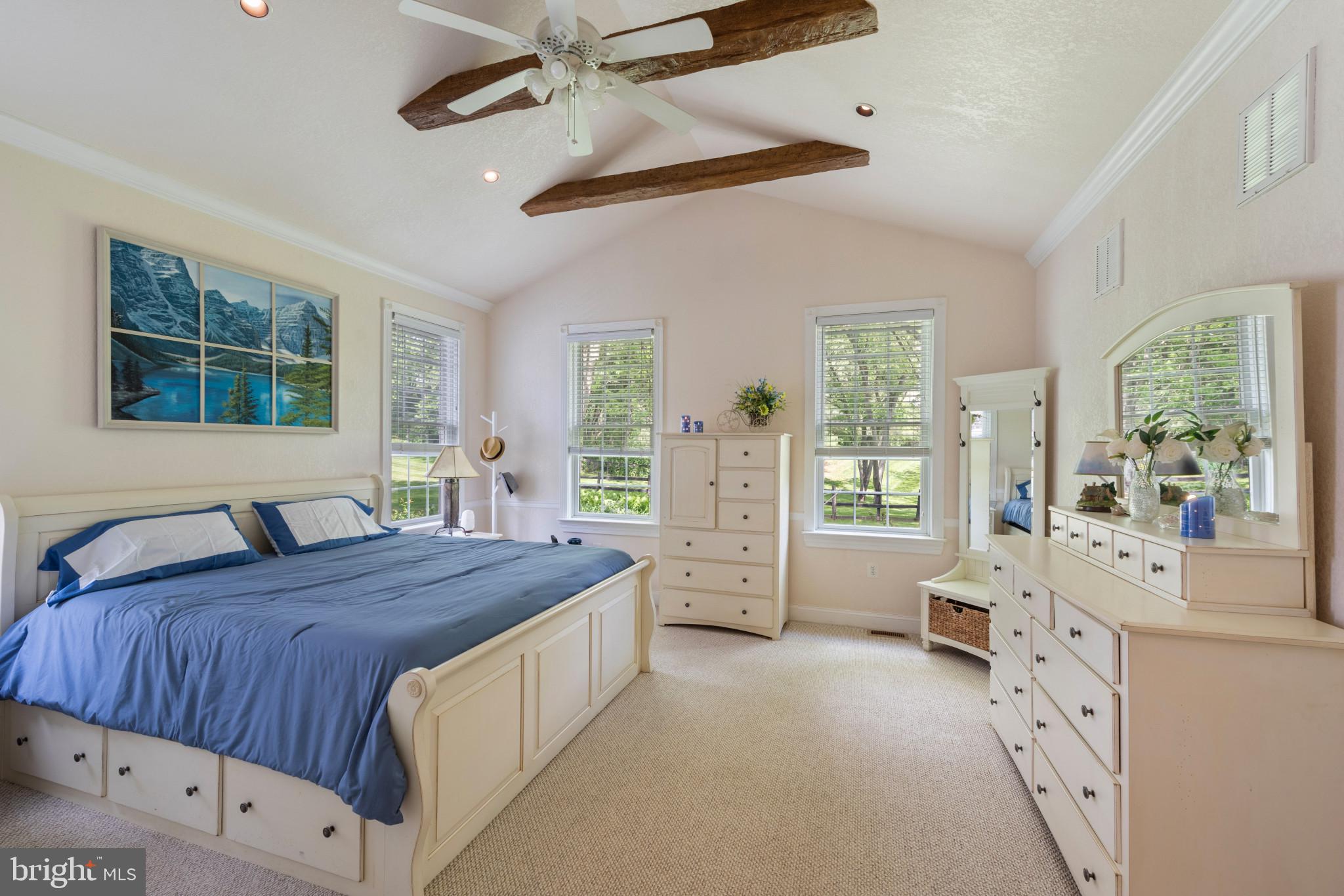 832 Muller Road Westminster, MD 21157 - Photo 10 of 39 a bedroom with a large bed and a large window