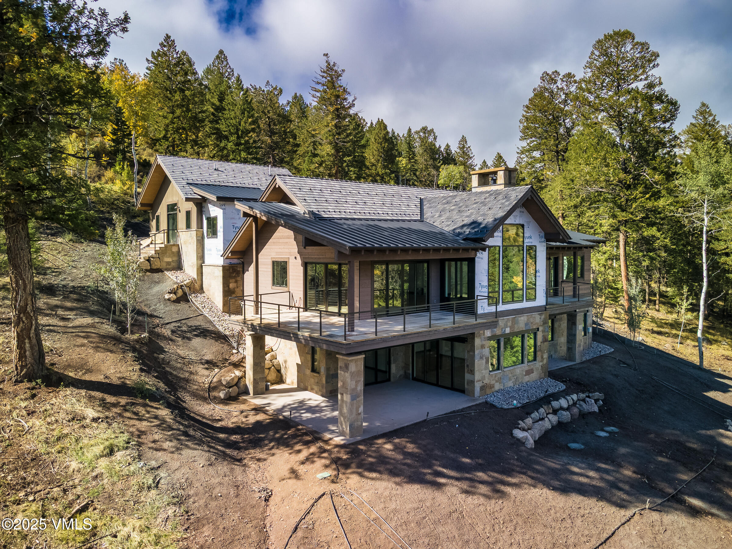 171 Sunquist Road Edwards, CO 81632 - Photo 32 of 101 a view of house with a yard