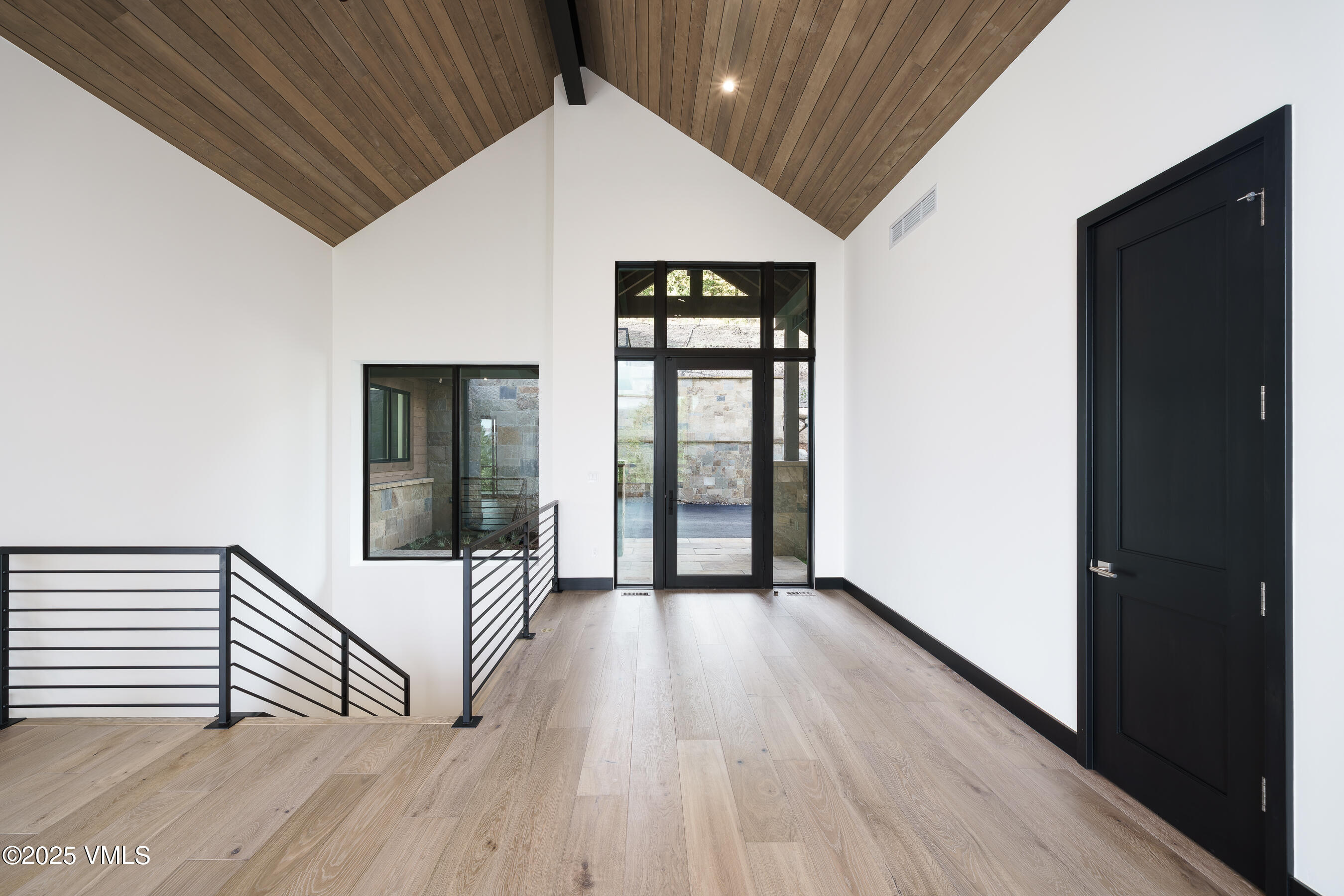 171 Sunquist Road Edwards, CO 81632 - Photo 41 of 101 a view of a hallway with wooden floor