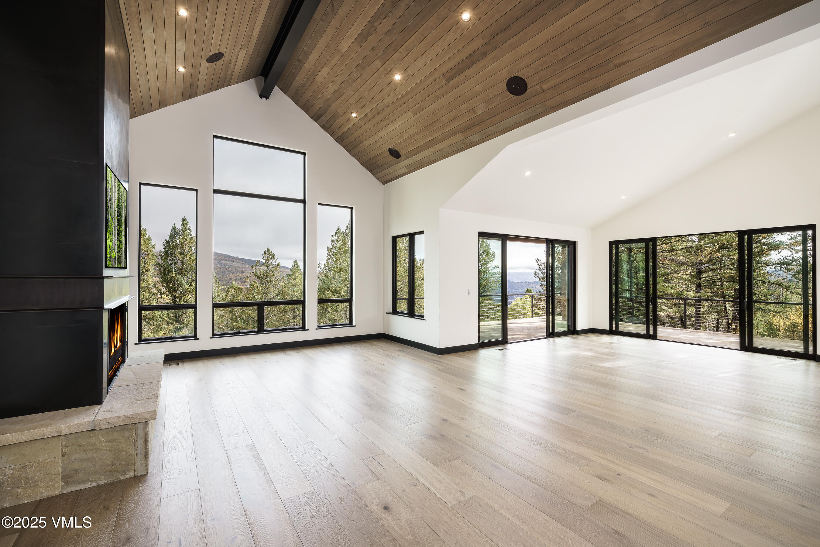171 Sunquist Road Edwards, CO 81632 - Photo 42 of 101 a view of an empty room with wooden floor and a window