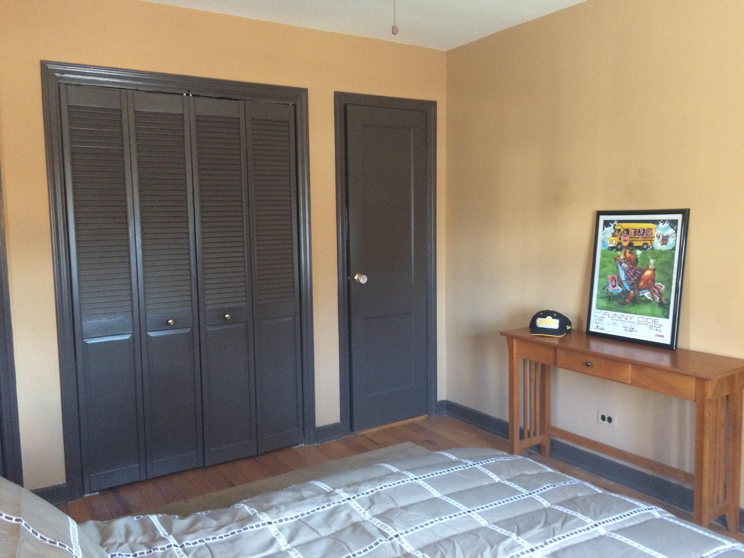 22 Pinckney Road, Unit C Red Bank, NJ 07701 - Photo 12 of 13 a view of a bedroom with closet and window